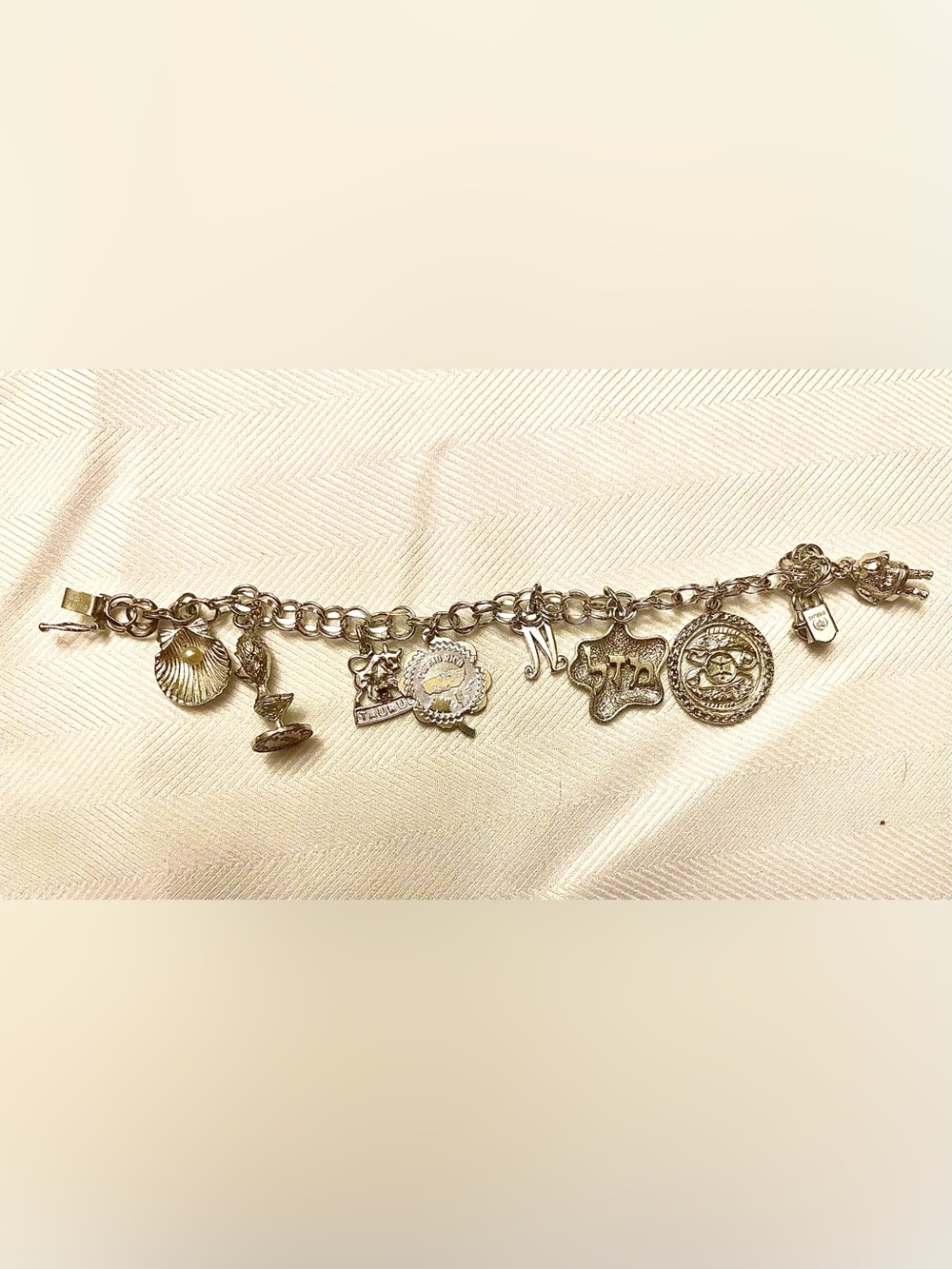 Vintage Sterling silver stamped Bracelet with Assorted sterling silver Charms